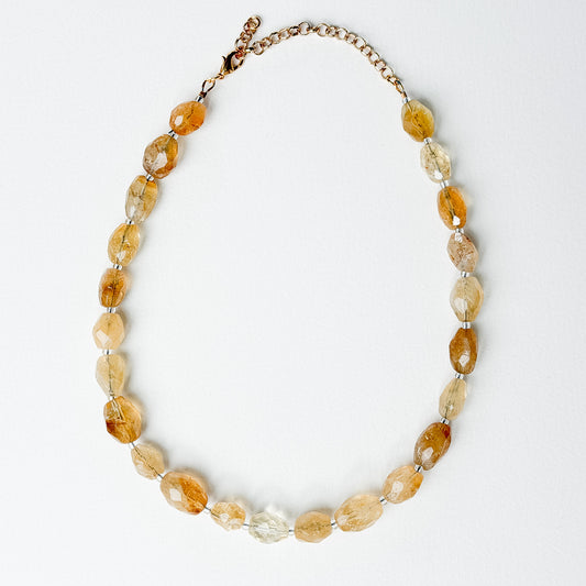 Solene citrine necklace laid flat